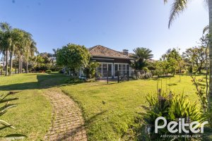 Casa em Condomínio à venda com 533m², 4 dormitórios, 2 suítes, 6 vagas, no bairro Terra Ville em PORTO ALEGRE
