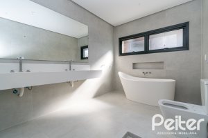 Casa em Condomínio à venda com 389m², 4 dormitórios, 4 suítes, 4 vagas, no bairro Terra Ville em PORTO ALEGRE