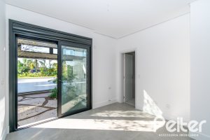 Casa em Condomínio à venda com 389m², 4 dormitórios, 4 suítes, 4 vagas, no bairro Terra Ville em PORTO ALEGRE