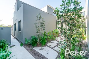 Casa em Condomínio à venda com 389m², 4 dormitórios, 4 suítes, 4 vagas, no bairro Terra Ville em PORTO ALEGRE