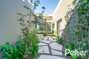 Casa em Condomínio à venda com 389m², 4 dormitórios, 4 suítes, 4 vagas, no bairro Terra Ville em PORTO ALEGRE