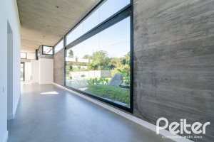 Casa em Condomínio à venda com 389m², 4 dormitórios, 4 suítes, 4 vagas, no bairro Terra Ville em PORTO ALEGRE