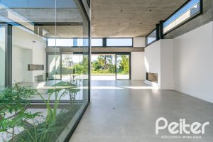 Casa em Condomínio à venda com 389m², 4 dormitórios, 4 suítes, 4 vagas, no bairro Terra Ville em PORTO ALEGRE