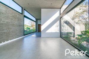 Casa em Condomínio à venda com 389m², 4 dormitórios, 4 suítes, 4 vagas, no bairro Terra Ville em PORTO ALEGRE