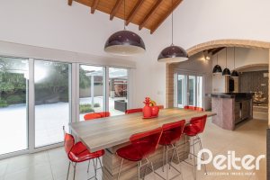 Casa em Condomínio à venda com 445m², 4 dormitórios, 4 suítes, 4 vagas, no bairro Terra Ville em Porto Alegre