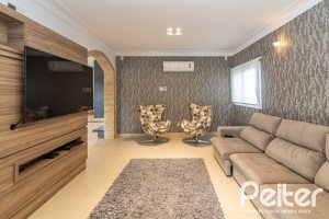 Casa em Condomínio à venda com 445m², 4 dormitórios, 4 suítes, 4 vagas, no bairro Terra Ville em Porto Alegre