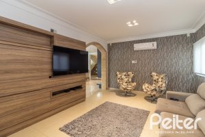 Casa em Condomínio à venda com 445m², 4 dormitórios, 4 suítes, 4 vagas, no bairro Terra Ville em Porto Alegre