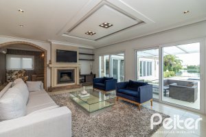 Casa em Condomínio à venda com 445m², 4 dormitórios, 4 suítes, 4 vagas, no bairro Terra Ville em Porto Alegre