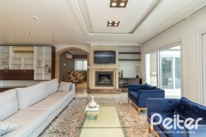 Casa em Condomínio à venda com 445m², 4 dormitórios, 4 suítes, 4 vagas, no bairro Terra Ville em Porto Alegre