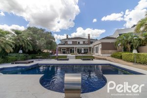 Casa em Condomínio à venda com 445m², 4 dormitórios, 4 suítes, 4 vagas, no bairro Terra Ville em Porto Alegre