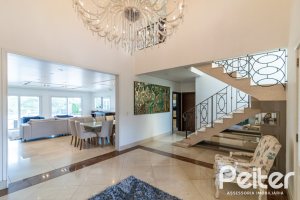 Casa em Condomínio à venda com 445m², 4 dormitórios, 4 suítes, 4 vagas, no bairro Terra Ville em Porto Alegre