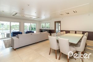 Casa em Condomínio à venda com 445m², 4 dormitórios, 4 suítes, 4 vagas, no bairro Terra Ville em Porto Alegre