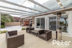 Casa em Condomínio à venda com 445m², 4 dormitórios, 4 suítes, 4 vagas, no bairro Terra Ville em Porto Alegre