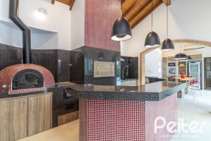 Casa em Condomínio à venda com 445m², 4 dormitórios, 4 suítes, 4 vagas, no bairro Terra Ville em Porto Alegre