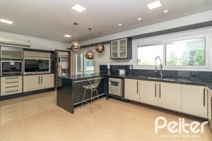 Casa em Condomínio à venda com 445m², 4 dormitórios, 4 suítes, 4 vagas, no bairro Terra Ville em Porto Alegre