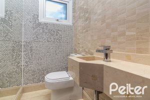 Casa em Condomínio à venda com 445m², 4 dormitórios, 4 suítes, 4 vagas, no bairro Terra Ville em Porto Alegre