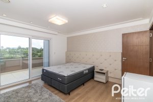 Casa em Condomínio à venda com 445m², 4 dormitórios, 4 suítes, 4 vagas, no bairro Terra Ville em Porto Alegre