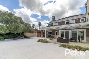 Casa em Condomínio à venda com 445m², 4 dormitórios, 4 suítes, 4 vagas, no bairro Terra Ville em Porto Alegre
