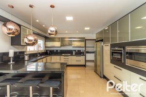 Casa em Condomínio à venda com 445m², 4 dormitórios, 4 suítes, 4 vagas, no bairro Terra Ville em Porto Alegre