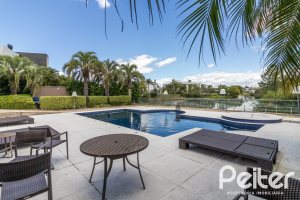 Casa em Condomínio à venda com 445m², 4 dormitórios, 4 suítes, 4 vagas, no bairro Terra Ville em Porto Alegre