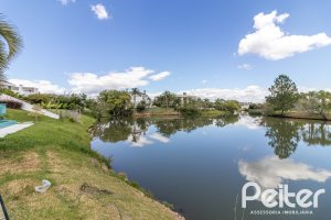 Casa em Condomínio à venda com 445m², 4 dormitórios, 4 suítes, 4 vagas, no bairro Terra Ville em Porto Alegre