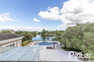 Casa em Condomínio à venda com 445m², 4 dormitórios, 4 suítes, 4 vagas, no bairro Terra Ville em Porto Alegre