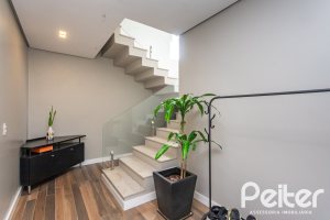 Casa em Condomínio à venda com 337m², 4 dormitórios, 1 suíte, 4 vagas, no bairro Alphaville em PORTO ALEGRE