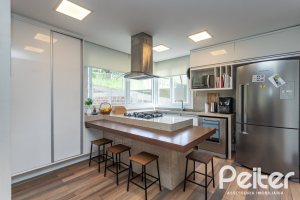 Casa em Condomínio à venda com 337m², 4 dormitórios, 1 suíte, 4 vagas, no bairro Alphaville em PORTO ALEGRE