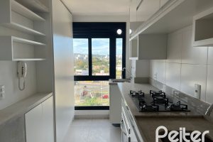 Apartamento à venda com 100m², 3 dormitórios, 1 suíte, 2 vagas, no bairro Cristal em Porto Alegre