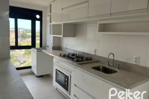 Apartamento à venda com 100m², 3 dormitórios, 1 suíte, 2 vagas, no bairro Cristal em Porto Alegre