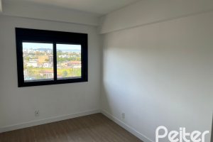 Apartamento à venda com 100m², 3 dormitórios, 1 suíte, 2 vagas, no bairro Cristal em Porto Alegre