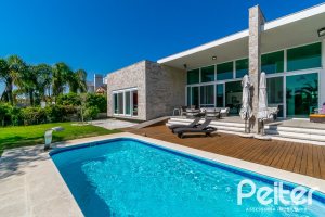 Casa em Condomínio à venda com 420m², 4 dormitórios, 4 suítes, 6 vagas, no bairro Terra Ville em PORTO ALEGRE