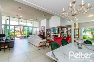 Casa em Condomínio à venda com 420m², 4 dormitórios, 4 suítes, 6 vagas, no bairro Terra Ville em PORTO ALEGRE