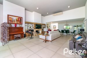 Casa em Condomínio à venda com 420m², 4 dormitórios, 4 suítes, 6 vagas, no bairro Terra Ville em PORTO ALEGRE