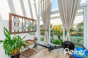 Casa em Condomínio à venda com 420m², 4 dormitórios, 4 suítes, 6 vagas, no bairro Terra Ville em PORTO ALEGRE
