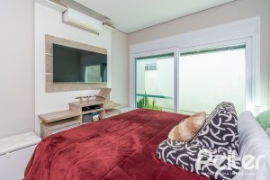 Casa em Condomínio à venda com 420m², 4 dormitórios, 4 suítes, 6 vagas, no bairro Terra Ville em PORTO ALEGRE