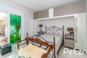 Casa em Condomínio à venda com 420m², 4 dormitórios, 4 suítes, 6 vagas, no bairro Terra Ville em PORTO ALEGRE