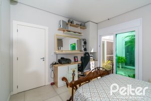Casa em Condomínio à venda com 420m², 4 dormitórios, 4 suítes, 6 vagas, no bairro Terra Ville em PORTO ALEGRE