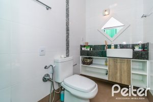 Casa em Condomínio à venda com 420m², 4 dormitórios, 4 suítes, 6 vagas, no bairro Terra Ville em PORTO ALEGRE