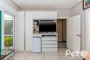 Casa em Condomínio à venda com 420m², 4 dormitórios, 4 suítes, 6 vagas, no bairro Terra Ville em PORTO ALEGRE