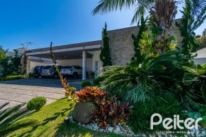 Casa em Condomínio à venda com 420m², 4 dormitórios, 4 suítes, 6 vagas, no bairro Terra Ville em PORTO ALEGRE