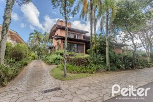 Casa em Condomínio à venda com 395m², 4 dormitórios, 4 suítes, 4 vagas, no bairro Cavalhada em PORTO ALEGRE