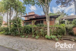 Casa em Condomínio à venda com 395m², 4 dormitórios, 4 suítes, 4 vagas, no bairro Cavalhada em PORTO ALEGRE
