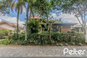 Casa em Condomínio à venda com 395m², 4 dormitórios, 4 suítes, 4 vagas, no bairro Cavalhada em PORTO ALEGRE