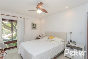 Casa em Condomínio à venda com 395m², 4 dormitórios, 4 suítes, 4 vagas, no bairro Cavalhada em PORTO ALEGRE