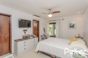Casa em Condomínio à venda com 395m², 4 dormitórios, 4 suítes, 4 vagas, no bairro Cavalhada em PORTO ALEGRE