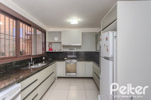 Casa em Condomínio à venda com 395m², 4 dormitórios, 4 suítes, 4 vagas, no bairro Cavalhada em PORTO ALEGRE