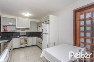 Casa em Condomínio à venda com 395m², 4 dormitórios, 4 suítes, 4 vagas, no bairro Cavalhada em PORTO ALEGRE