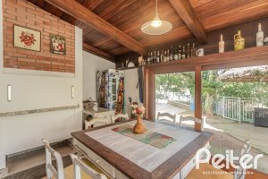 Casa em Condomínio à venda com 395m², 4 dormitórios, 4 suítes, 4 vagas, no bairro Cavalhada em PORTO ALEGRE
