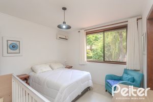 Casa em Condomínio à venda com 395m², 4 dormitórios, 4 suítes, 4 vagas, no bairro Cavalhada em PORTO ALEGRE